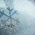 snowflake drawn on car window